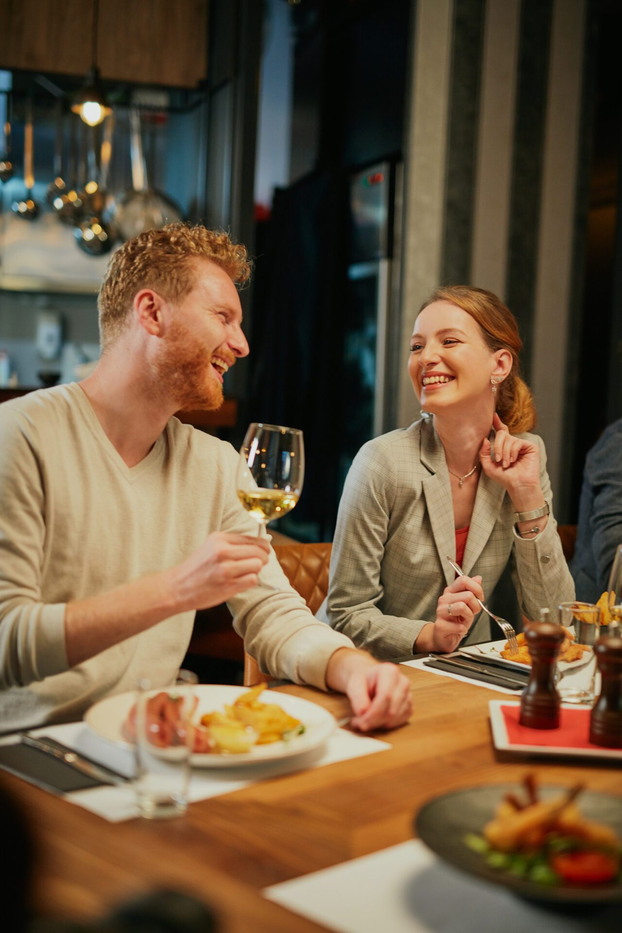 friends sitting in restaurant for dinner